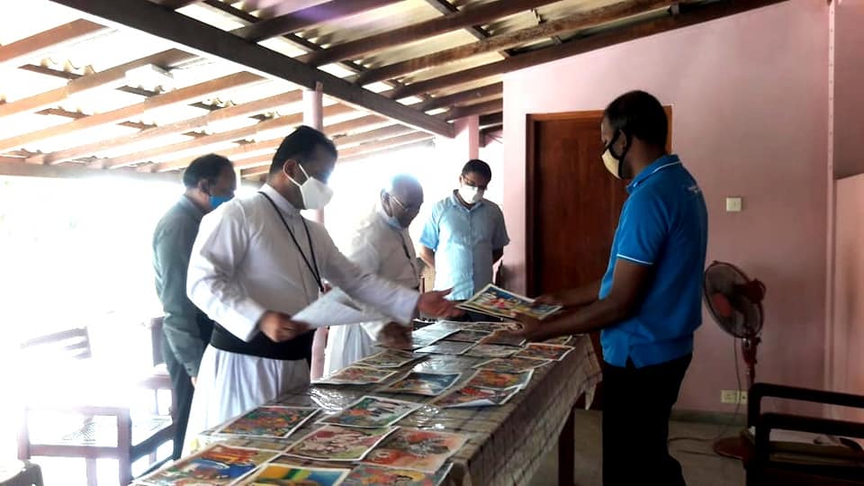 Selecting winner of Christmas postage stamp art competition 2022