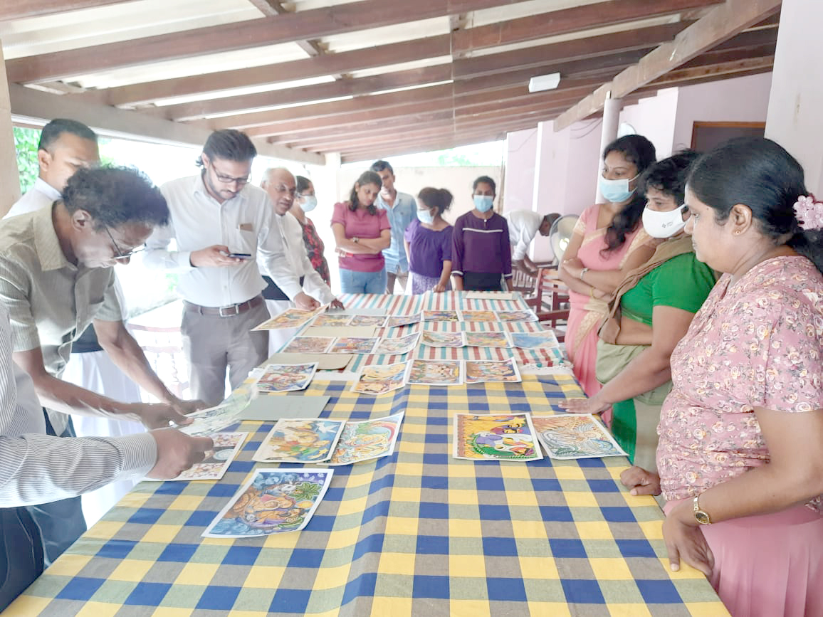 Selecting winner of Christmas postage stamp art competition 2022